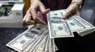 الدولار يهبط أمام الين بعد إعلان ترامب عن اتفاق تجاري مع اليابان